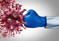 Boxing glove punching virus cell.